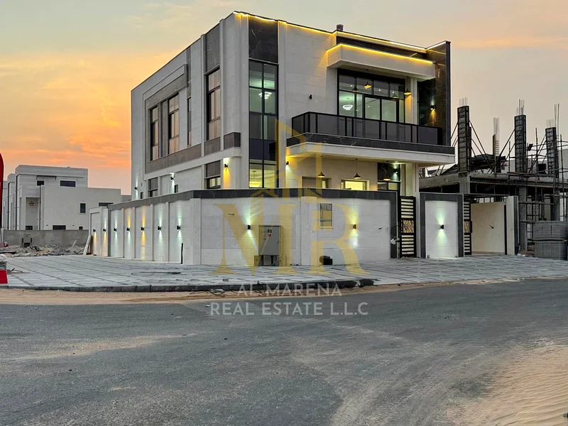 A villa with a price including registration and ownership fees on the main street, ready for occupancy in the most upscale areas of Ajman, freehold fo63911300420098110