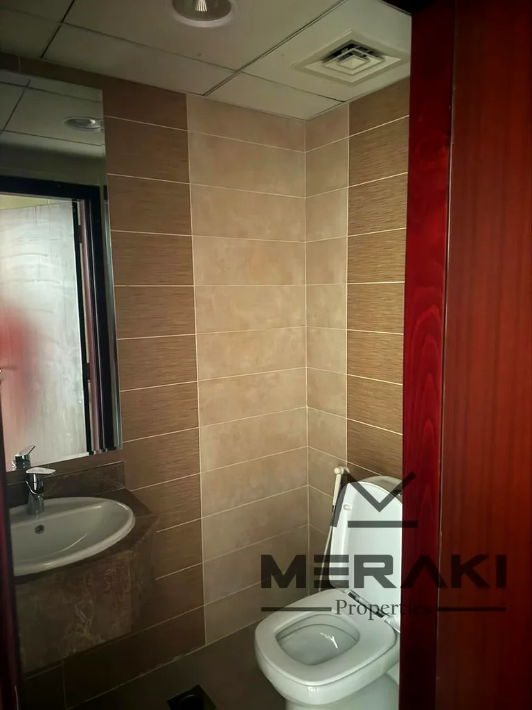 شقة فاخرة من غرفتي نوم في برج كونكوير، عجمان – إطلالات خلابة وموقع متميز63865990195075114