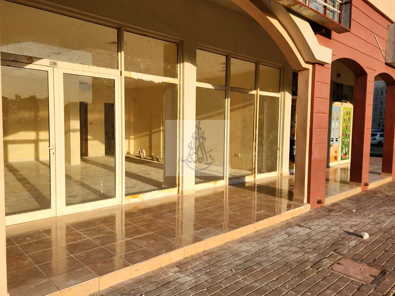 Prime Front-Side Rented Shop for Sale in England Cluster – Heart of International City | Ideal for All Businesses | 780K AED Only63825682482051112