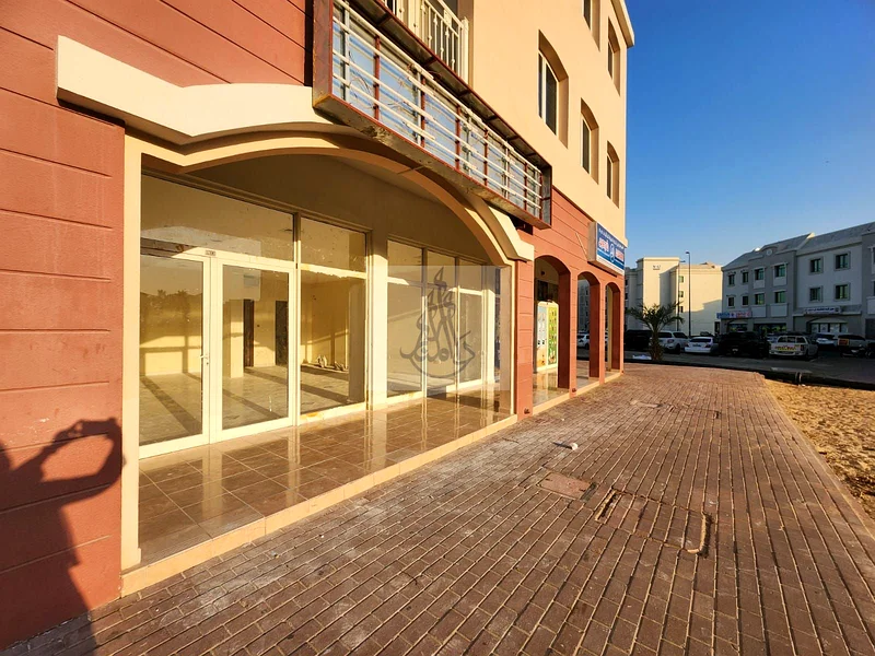 Prime Front-Side Rented Shop for Sale in England Cluster – Heart of International City | Ideal for All Businesses | 780K AED Only63825682482051110