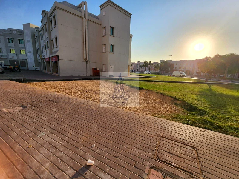 Prime Front-Side Rented Shop for Sale in England Cluster – Heart of International City | Ideal for All Businesses | 780K AED Only63825682482051111