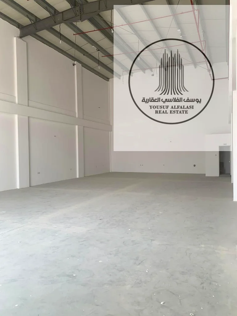 For rent in Ajman Al Jurf Industrial 2 showrooms on a main street, suitable for manufacturing, 3100 square feet, one electricity 40 kW, price 180 thou64074008097411112