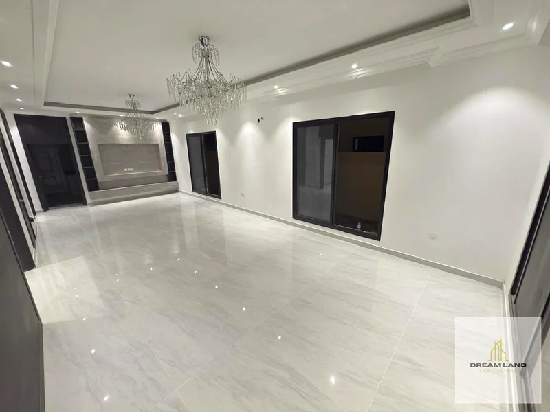 Villa for sale in Al Helio 2, Ajman, 5 master bedrooms with built-in wardrobes, a hall, two halls, and a spacious kitchen63912253672578114