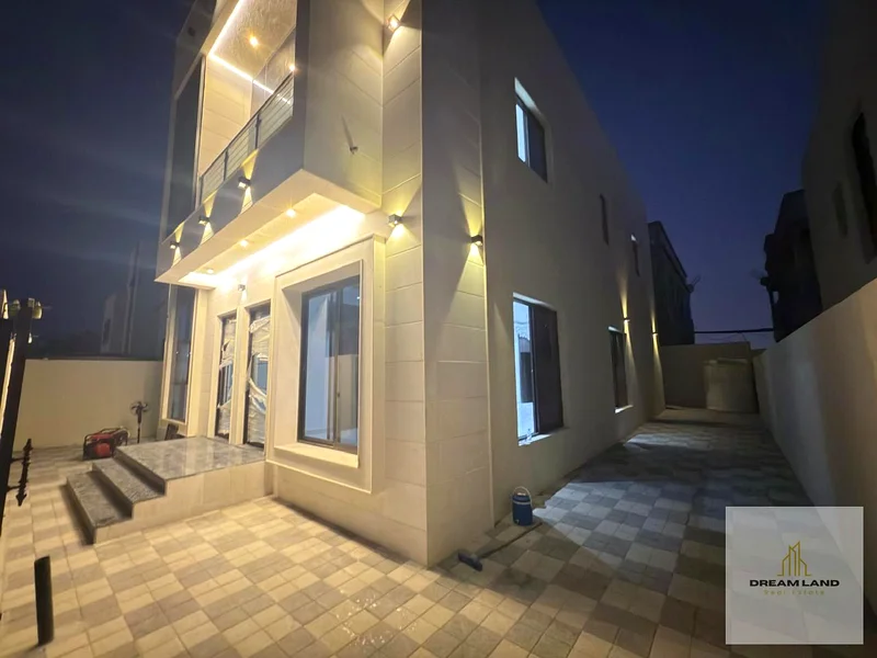 Villa for sale in Al Helio 2, Ajman, 5 master bedrooms with built-in wardrobes, a hall, two halls, and a spacious kitchen63912253672578112
