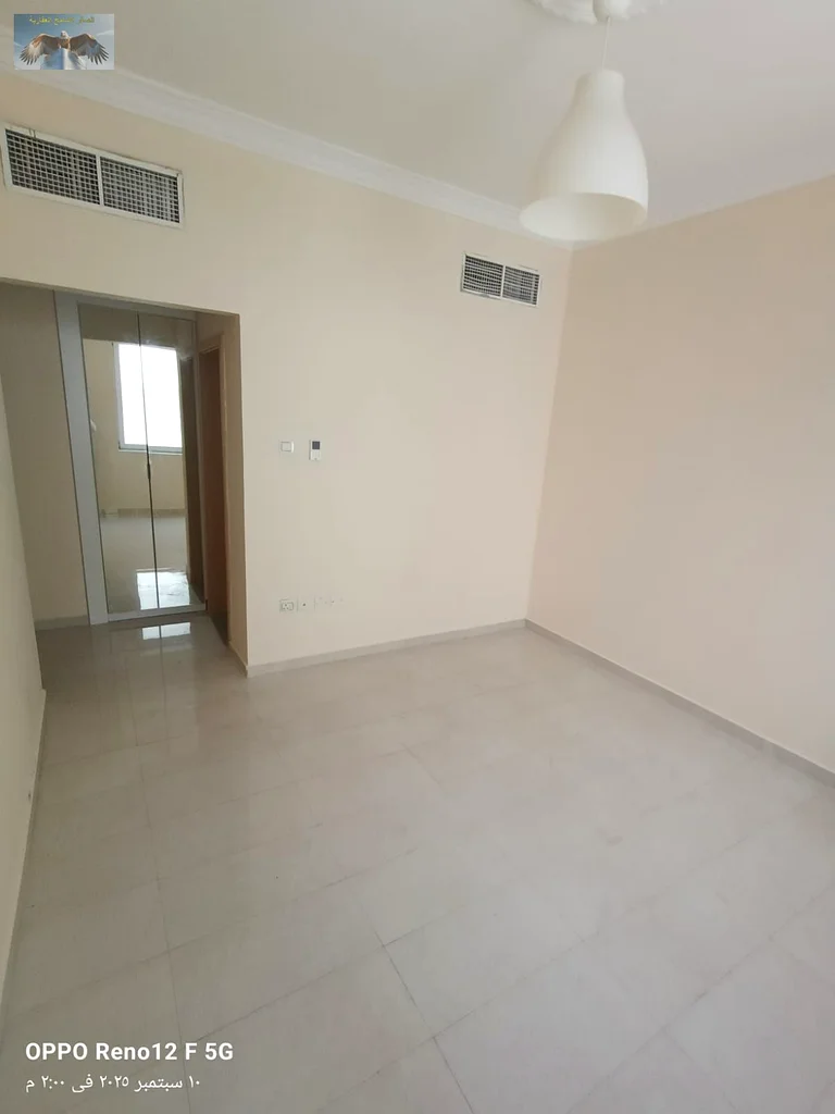 Apartment for Rent in Al Jurf 2 – Ajman, spacious 2BHK with 2 bathrooms, wardrobes, balcony, near Al Aqsa School, only 43K in 4 payments63714836773505111