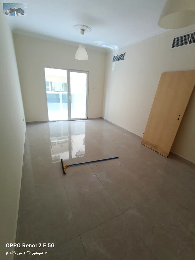 Apartment for Rent in Al Jurf 2 – Ajman, spacious 2BHK with 2 bathrooms, wardrobes, balcony, near Al Aqsa School, only 43K in 4 payments63714836773505110