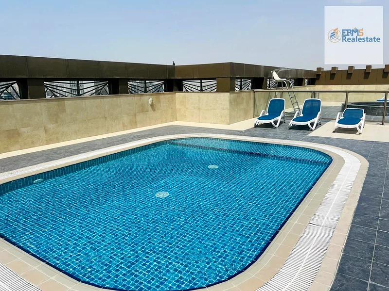 “Modern 1BHK with Balcony & American Kitchen | Luxury Amenities: Gym, Pool, Parking, Steam & Sauna”63807418842243110