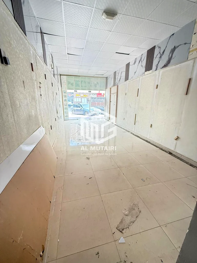 محل للإيجار في شارع الشيخ عمار الرئيسي - عجمان | مساحة واسعة بسعر خاص ومخفض64073229254018110