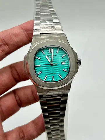 Exquisite Patek Philippe Mens Watch with Turquoise Dial