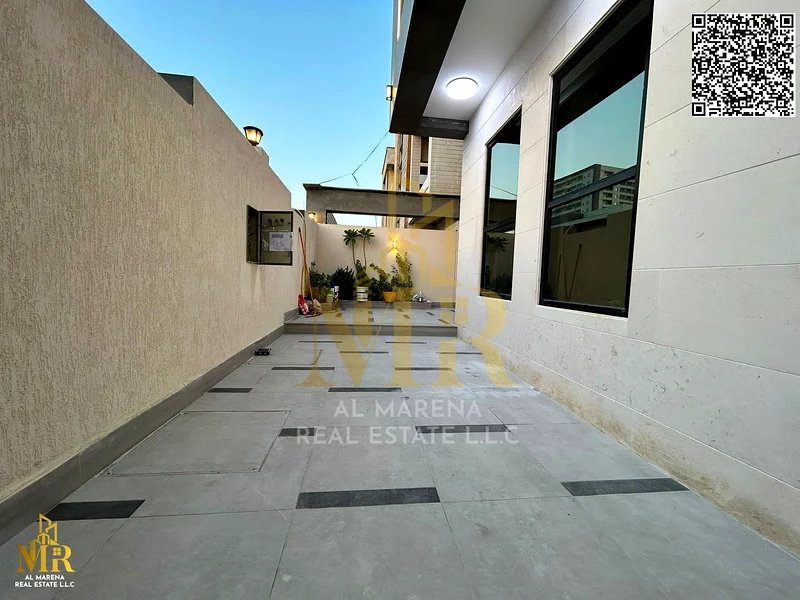 For sale, a luxury villa in Al Bahia with electricity, water, and air conditioning - Ajman | Two floors + roof | 5 master bedrooms | Majlis + hall | S63884375182594112