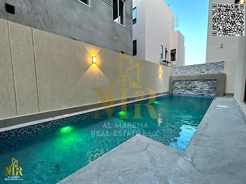 For sale, a luxury villa in Al Bahia with electricity, water, and air conditioning - Ajman | Two floors + roof | 5 master bedrooms | Majlis + hall | S63884375182594114