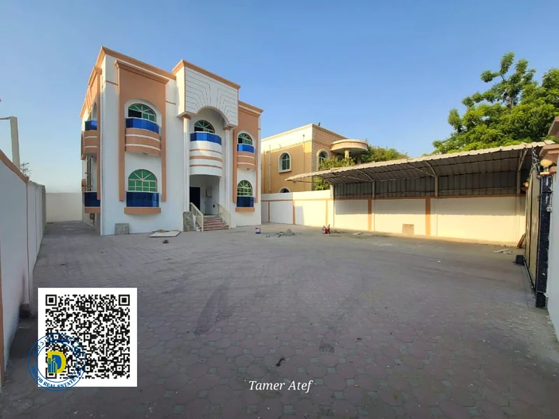 For sale, an excellent villa in Ajman, in the Rawda 3 area, with a large area of ​​5000 square feet, 5 rooms, including water and electricity, freehol63878296952578111