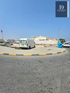 For Sale in Sharjah Al Hazana Area Residential Land Corner on Two Streets Ground Floor and First Flo