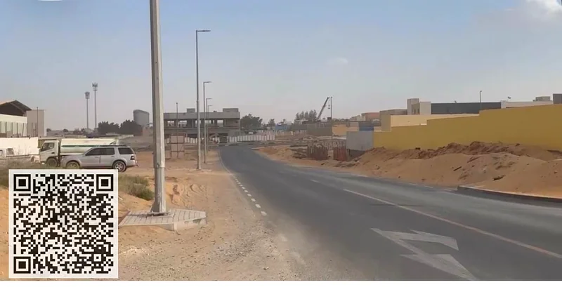 For rent walled land in  Sajaa area  Sharjah  Prime location   corner \ main Street64057583443970112