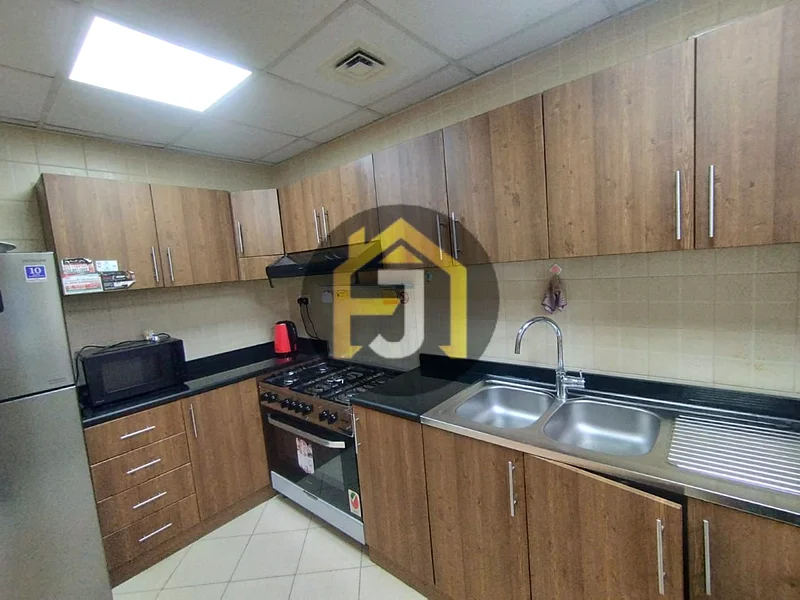 Two-bedroom apartment for sale in Ajman One Tower with city and garden view63866414183171113
