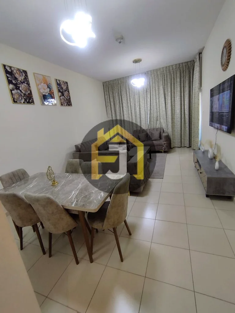 Two-bedroom apartment for sale in Ajman One Tower with city and garden view63866414183171114