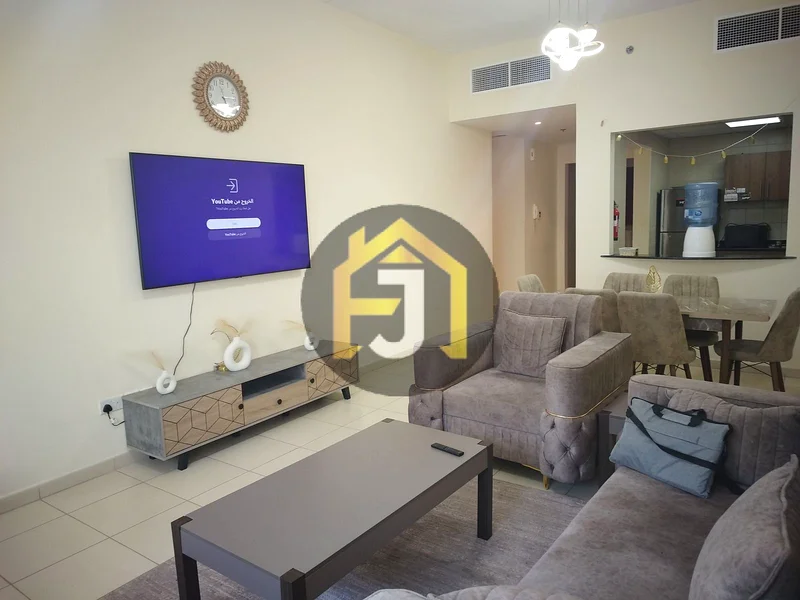 Two-bedroom apartment for sale in Ajman One Tower with city and garden view63866414183171110
