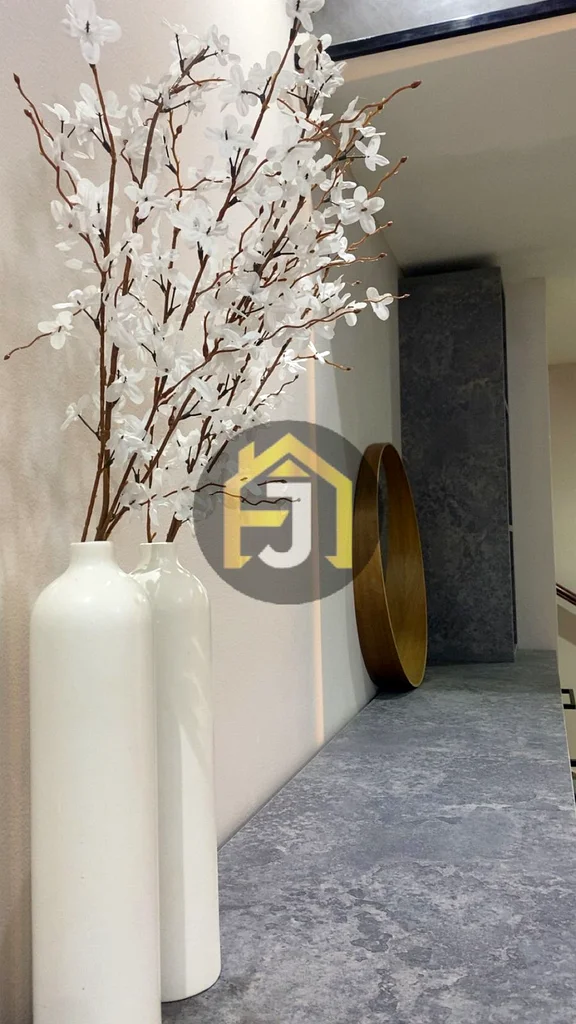 Own two bedrooms and a hall for sale in the Corniche Residence Towers, Ajman, with a full view of the city and the creek63870459184130110