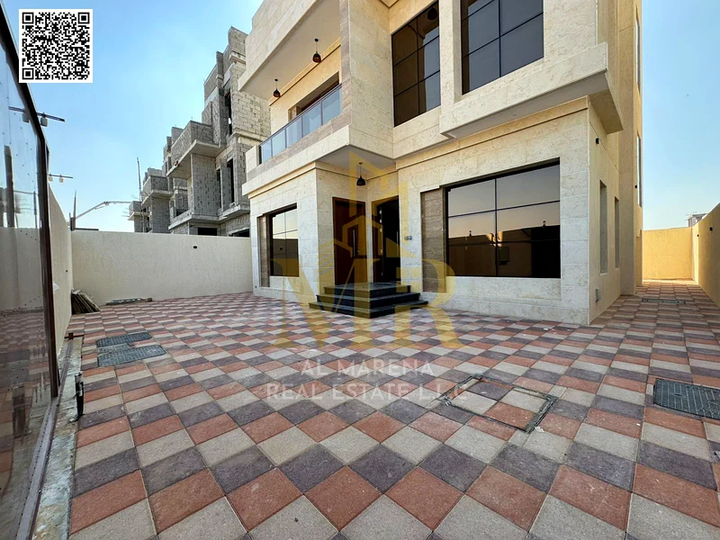 For sale - a spacious villa in Al Bahia Al Asoul - Ajman | Area 3014 square feet | Two floors + roof + courtyard | 6 master bedrooms | Majlis and hall63884375200770114
