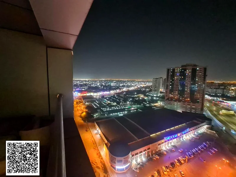 شقة من غرفتي نوم للبيع – حمامان، تكييف مركزي، إطلالة مفتوحة جميلة، تشطيب فاخر، موقع مميز محاط بجميع الخدمات.63865773197570113