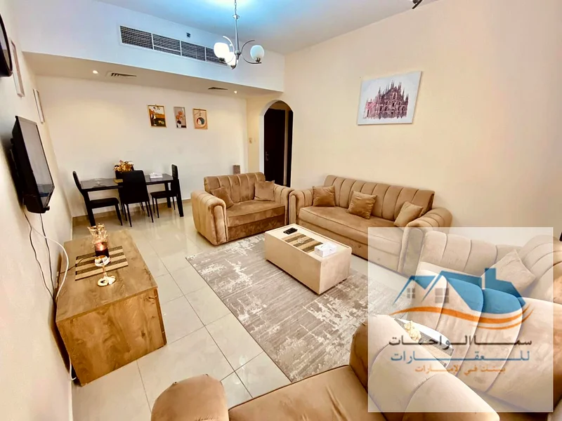 Al-Khan, Al-Rose Tower, a room and a lounge with a sea view. The price is 4500 dirhams, including internet and a sandy parking.64189493918339114