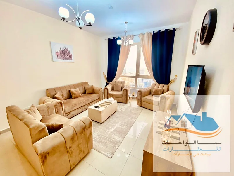 Al-Khan, Al-Rose Tower, a room and a lounge with a sea view. The price is 4500 dirhams, including internet and a sandy parking.64189493918339111