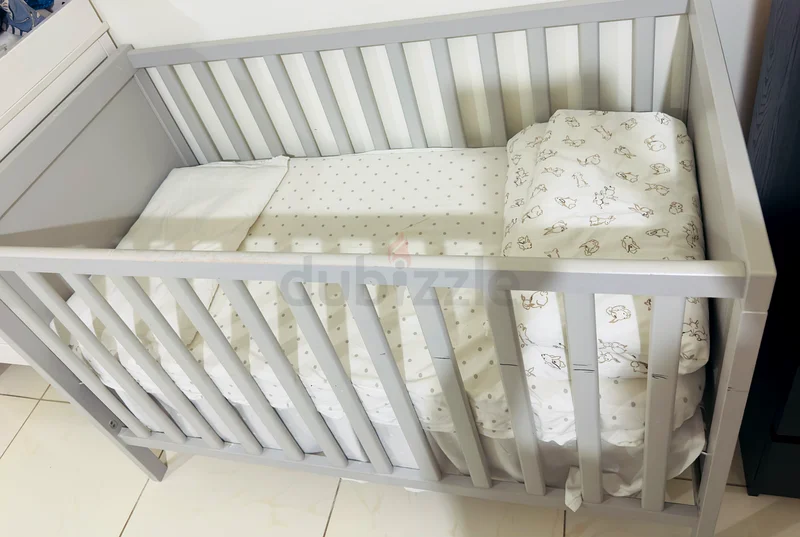 Cozy Grey baby cot for Your Little One with Mattress from Ikea