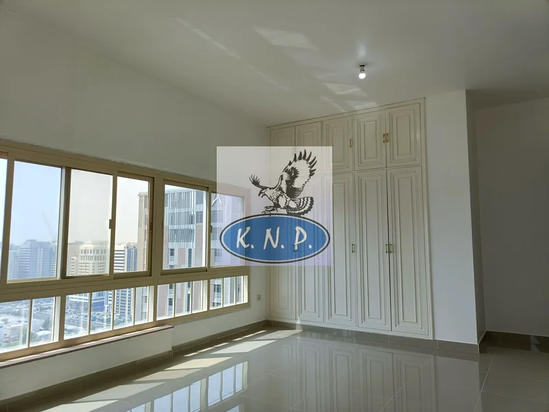 Only 90K Yearly! Elegant 3-Bedroom C/AC Flat on Hamdan St. in Abu Dhabi64052107575299114