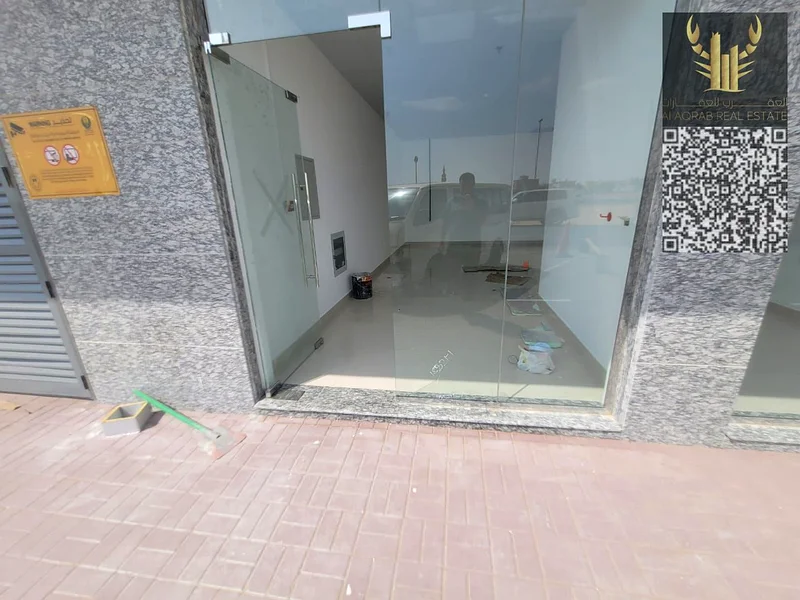 متاح متجر تجاري بمساحة 650 قدم مربع للإيجار السنوي في عجمان، الجرف 3، على شارع رئيسي بالقرب من مخرج دبي، بسعر 65,000 درهم64073562297731112