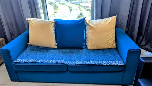 Stylish Blue Sofa with Cushions for Sale