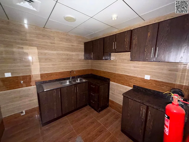 Free parking – Stunning 2BR hall in Al Rawda – Spacious rooms & large kitchen – 2 baths – Central AC – Stylish finish – Prime location.64053302081154114