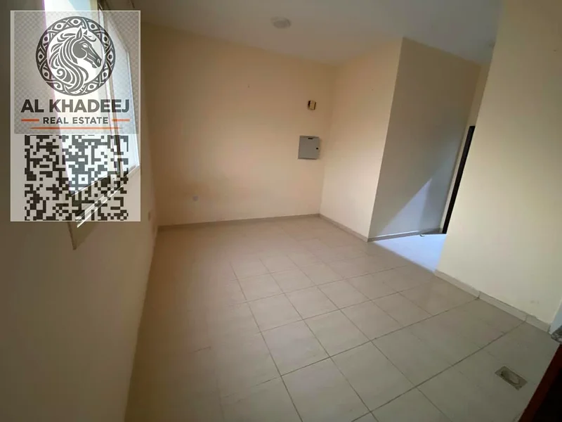 Studio apartment for annual rent in Al Alia, Ajman, located near main roads with easy access to Dubai and Sharjah, affordable price, includes kitchen64219691171458113