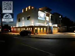 For sale in Al Yasmeen, Ajman, a corner townhouse with 5 rooms, a living room, and a hall, including