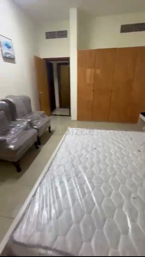 تتوفر غرفة نوم رئيسية في الشارقة القاسمية للعائلات64053626661506111