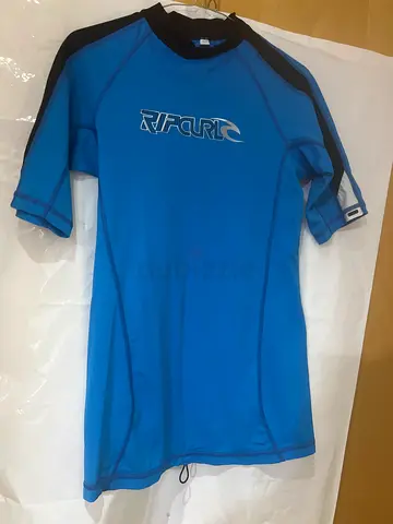 Stylish Blue Surfing Rash Guard - Perfect for Water Sports!