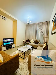 Room and living room cooperation behind Day Today Al-Hajri Tower with a balcony