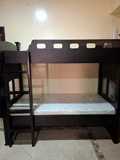 Wooden Bunker bed near insurance market metro