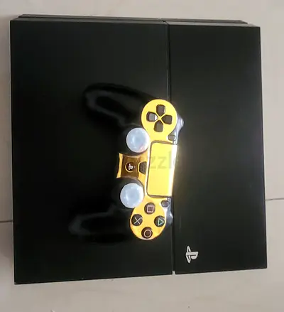 Stylish Sony PlayStation 4 Console with Golden Controller