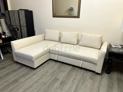 IKEA Holmsund L-shape sofa bed with storage in beige