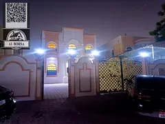 For sale, a villa in Al Rawda 3, Ajman, 5 rooms, a living room, a maid's room, and a spacious ya