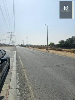For Sale in Sharjah Al Dabdaba North Al Zubair Suburb Commercial Land in the New Project Two-Year In