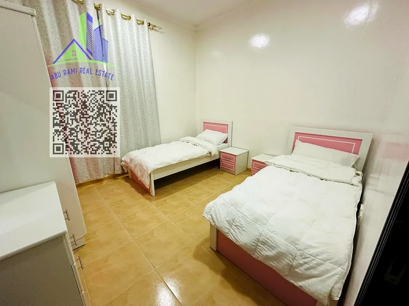 Two rooms and a hall, monthly, furnished, in Al Muwaihat 3 - new furniture - close to the Dubai exit - 4500 including bills64050247595651112