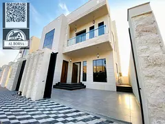 For sale, a villa in Al Helio 2, Ajman, 5 bedrooms, a majlis, a hall, a maid's room, and a spaci