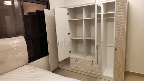 Elegant White Wardrobe with Ample Storage Space