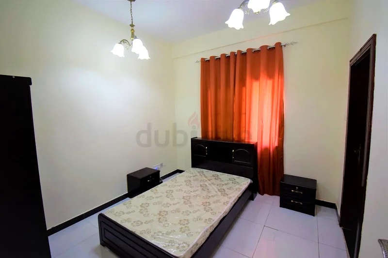 غرفة شبه مفروشة مع حمام داخلي وشرفة بالقرب من ديرة كلاك تاور روندابوت64048402212609110