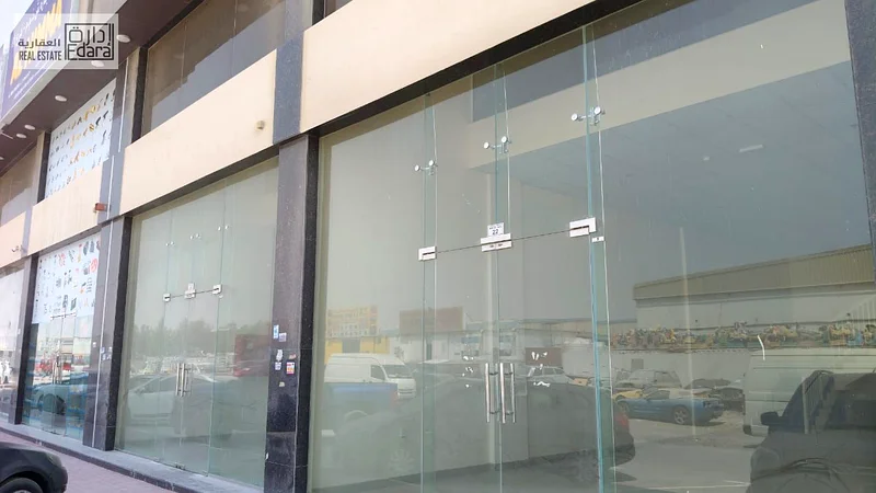 For Rent: Shop (Showroom) in Al Jurf Industrial Area 2 – Suitable for showrooms or commercial activities.64073895105793110