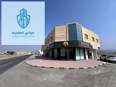 For Sale | Residential and commercial building in Masfout 8 - Ajman / Ground floor and first corner