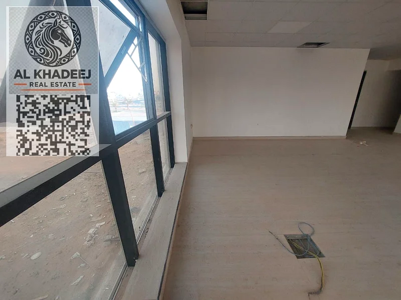 Office in a new building  In Al Bahia for annual rent  In Al Mizanah  Very large area Central air conditioning64072889751299113