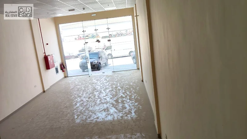 For Rent: Shop (Showroom) in Al Jurf Industrial Area 2 – Suitable for showrooms or commercial activities.64073895105793114