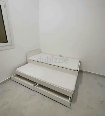 ‎Ikea slakt bed frame with under bed and 2 storage drawers underneath with 2 Ikea mattresses